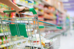 parent shopping for foods included in a tooth healthy diet