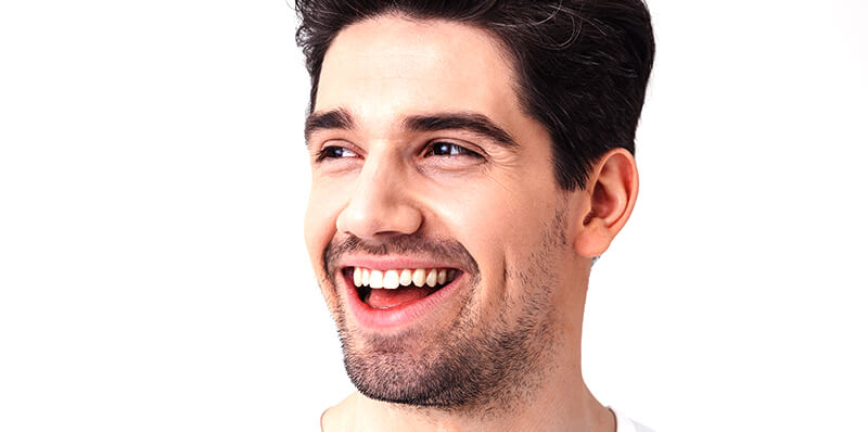 man smiling showing nice teeth