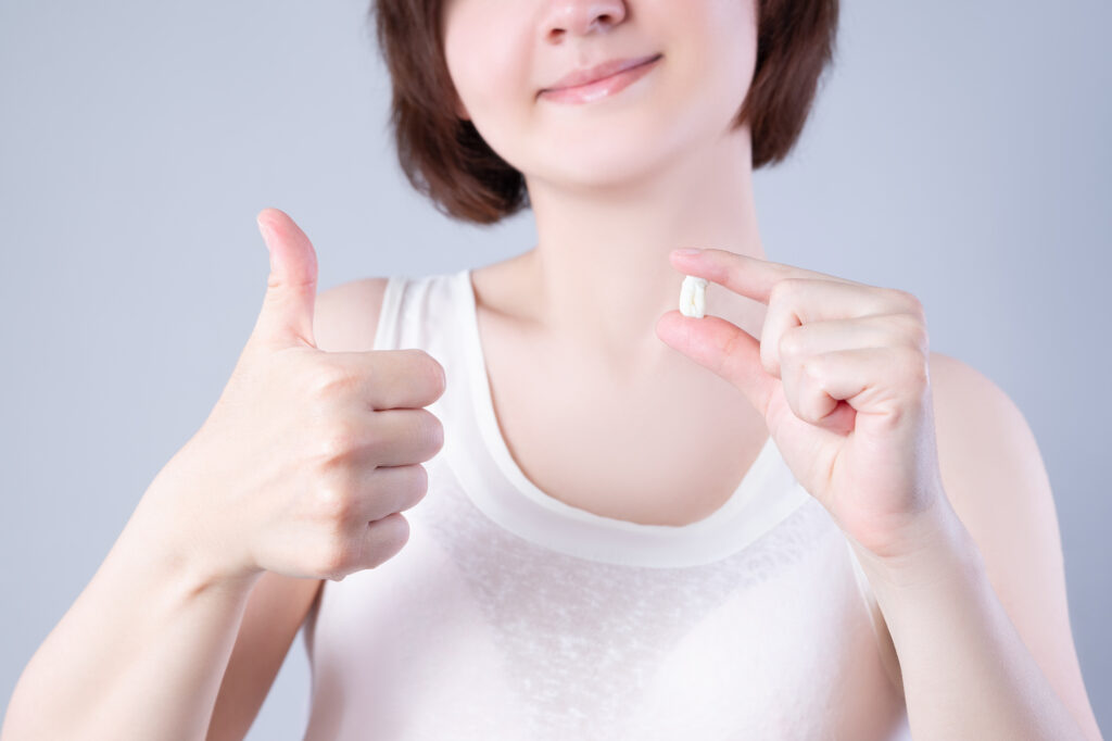 Woman with a tooth extraction.